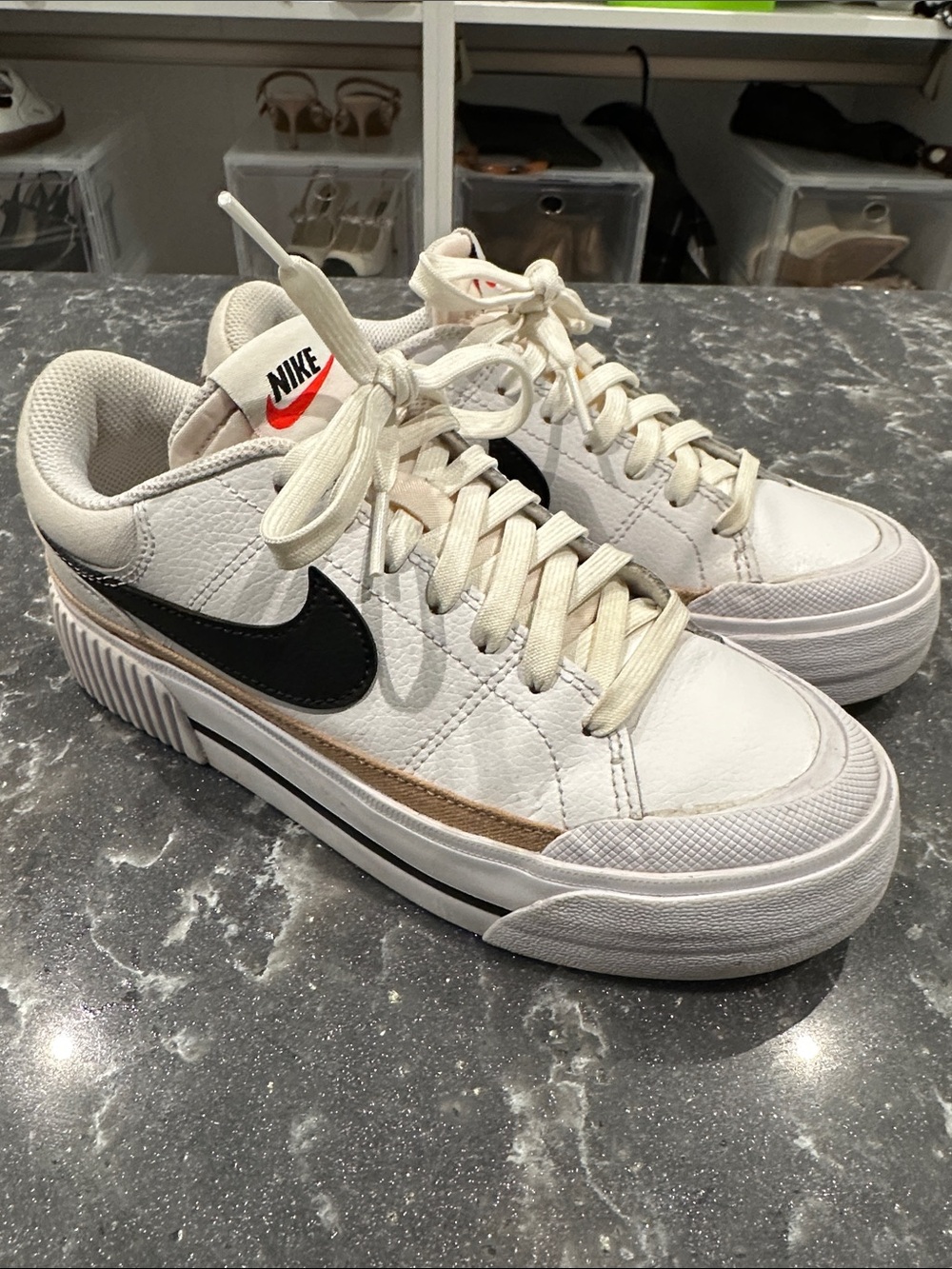 Nike White Sneakers with Black Swoosh and Tan Accent